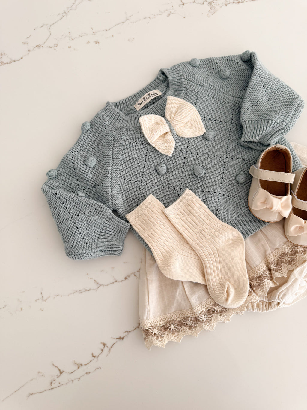 Pom Pom Knit Sweater