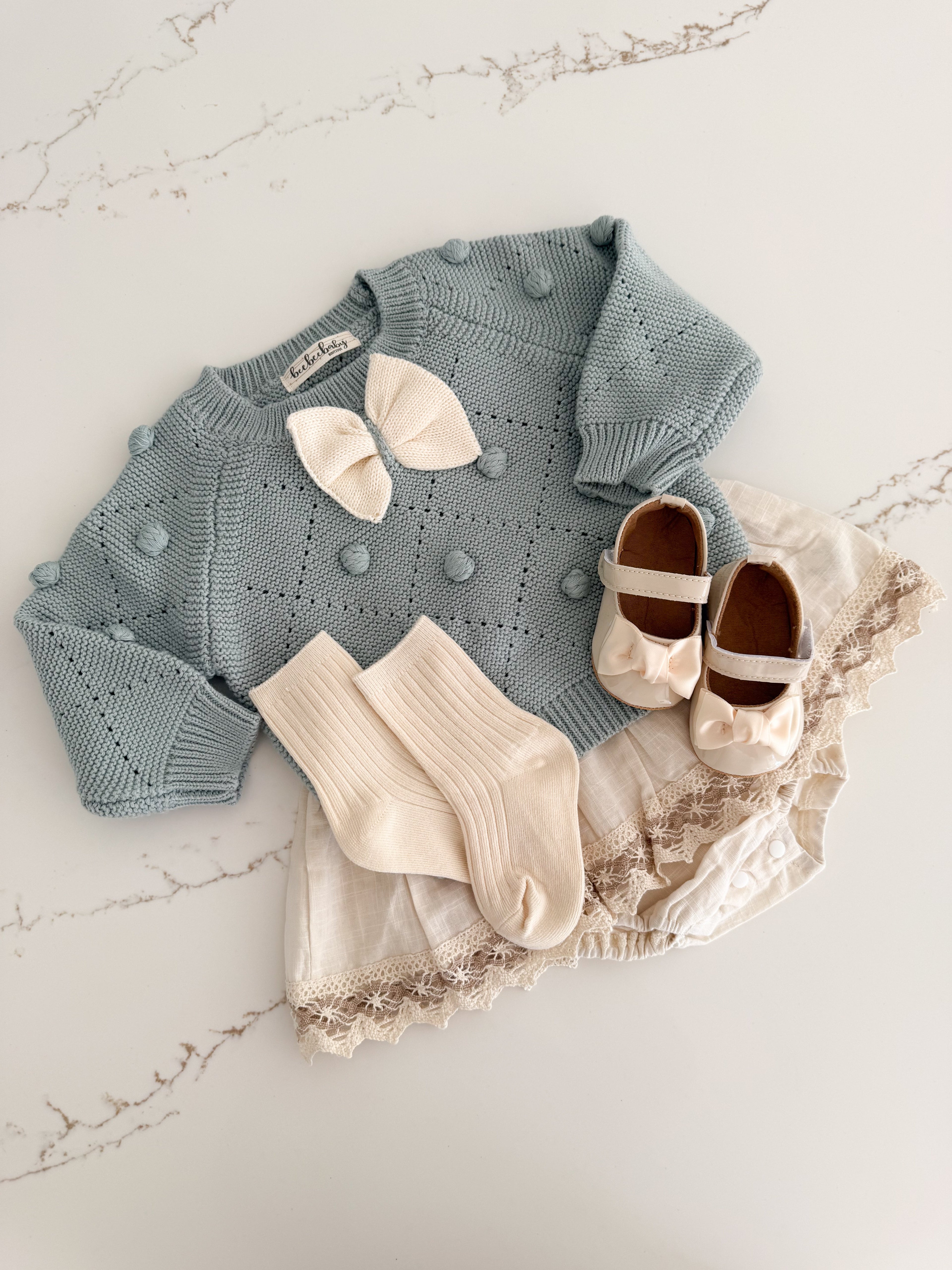 Pom Pom Knit Sweater